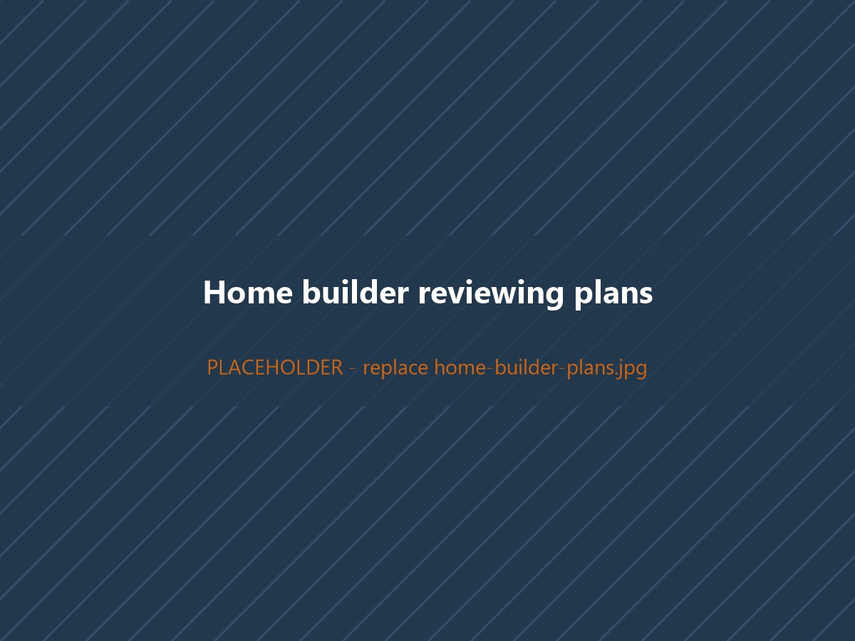 Arkansas home builder reviewing plans and a material order